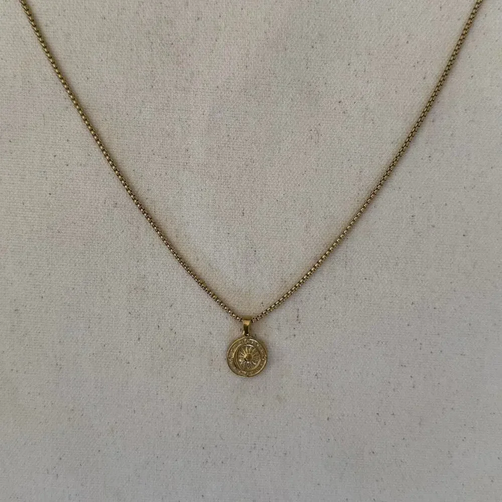 Y2k 2000s circular gold sun